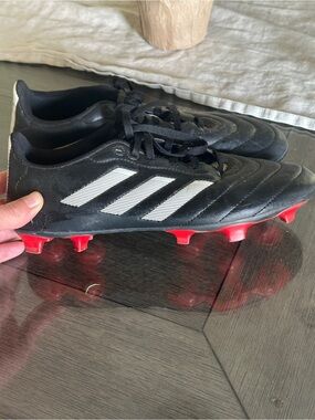 adidas Black Soccer Cleats with White Stripes and Red Studs